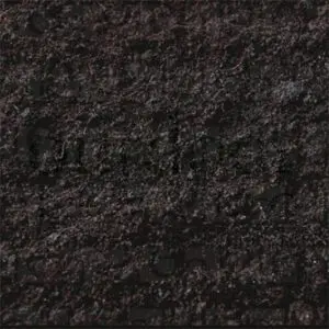 Close-up of dark, textured soil or compost.